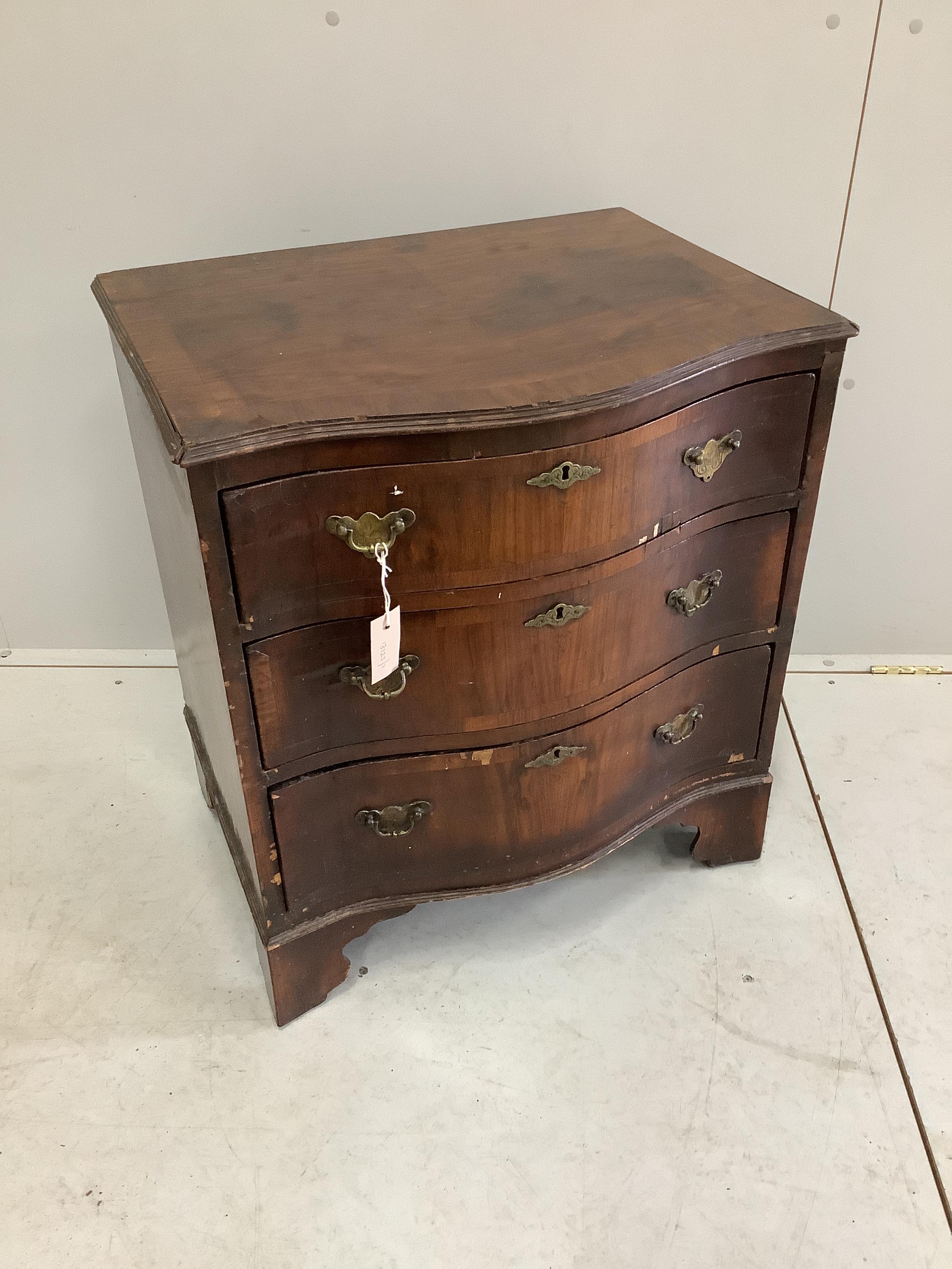 A small Queen Anne revival walnut serpentine three drawer chest, width 63cm, depth 48cm, height 70cm